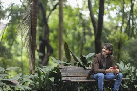 View of a young man with smartphone Stock Photos