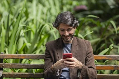 View of a young man with smartphone Stock Photos