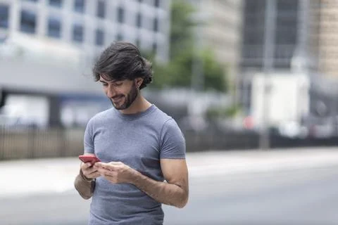 View of a young man with smartphone Stock Photos