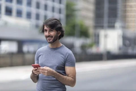 View of a young man with smartphone Stock Photos