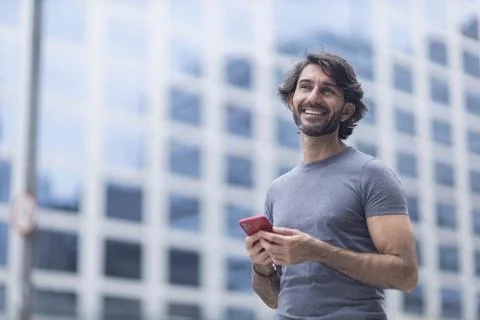 View of a young man with smartphone Stock Photos