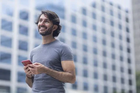 View of a young man with smartphone Stock Photos