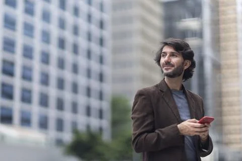 View of a young man with smartphone Stock Photos