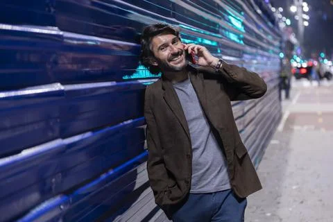 View of a young man with smartphone Stock Photos