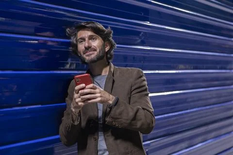 View of a young man with smartphone Stock Photos