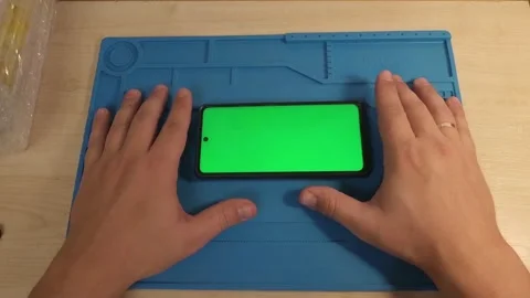 View your phone on your work mat Stock Footage 168442678