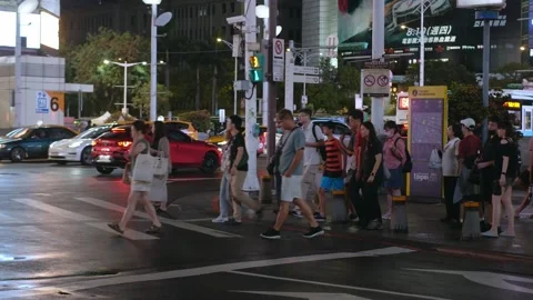 View at zebra crossing intersection area while people pedestrian walking cr.. Stock Footage 309626649