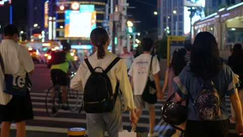 View at zebra crossing intersection area while people pedestrian walking cr.. Stock Footage 309626727