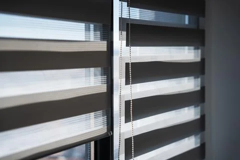 View of Zebra Window Blinds With Soft Light and Shadow Foto stock