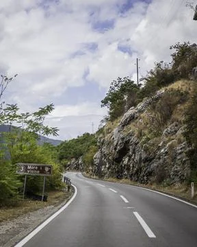 View of a zig zag road along Kotor Bay during a cloudy day, Montenegro. 스톡 사진