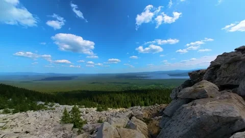View from the Zyuratkul mountain range to the high-mountain lake in the Southern Stock Footage 325378916