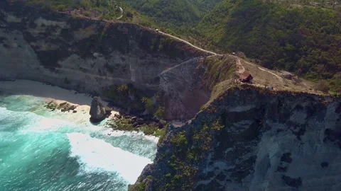 Viewed from the air, the gentle lapping of turquoise colored crystal clear ocean Stock Footage 294658921