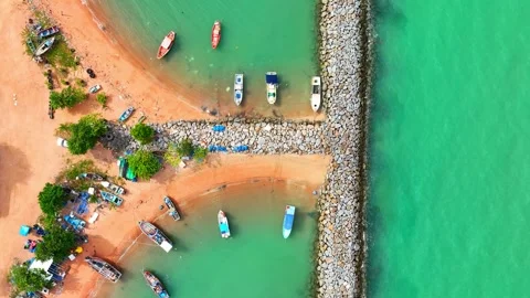 Viewed from a drone's aerial perspective, breakwaters present a striking. Stock Footage 249727261