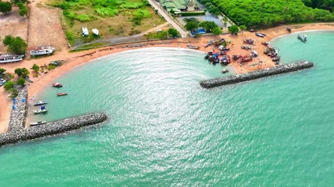 Viewed from a drone's aerial perspective, breakwaters present a striking. Stock Footage 249727620