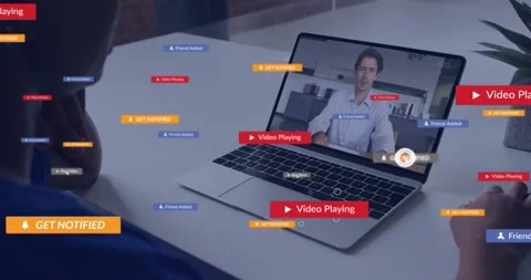 Viewer clicking play button on laptop activating red alerts, icons swirling Stock Footage 319571780