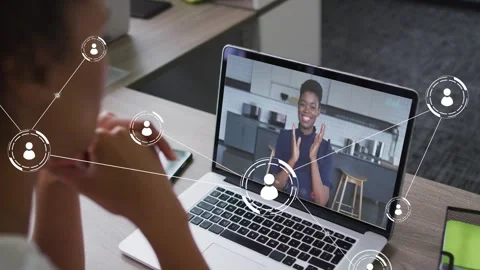 Viewer sitting desk watching laptop, host clapping animating node web linking Video stock 334000144