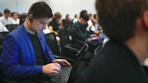 Viewer use notebook crowd political summit. Audience business people type laptop Stock Footage 139312002