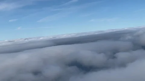 Viewfrom the top of the clouds while is raining Stock Footage 237110592