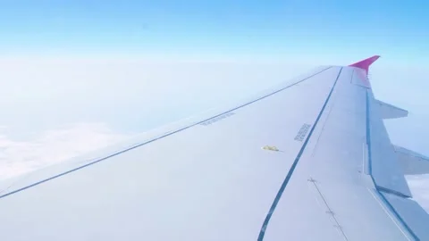 Viewing an airplaes wing from inside Stock Footage 182893397