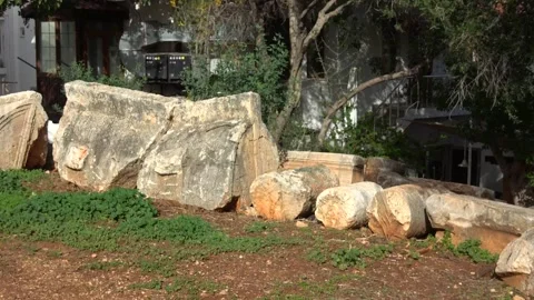 Viewing ancient Lycian stone columns and sarcophagus fragments in Kas city 動画素材 343161175