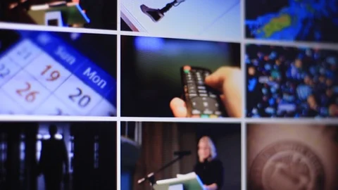 Viewing and scrolling through the various images on the computer display Stock Footage 109042901