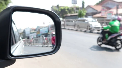 Viewing from car rear view mirror Video stock 117973970