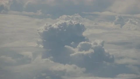 Viewing cauliflower clouds from cabin window Stock Footage 154419369
