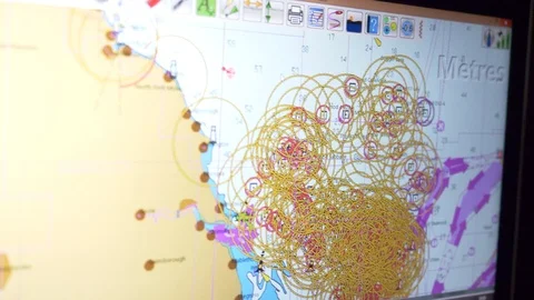 Viewing a digital nautical chart on a computer screen in a sailing boat Stock Footage 107088261