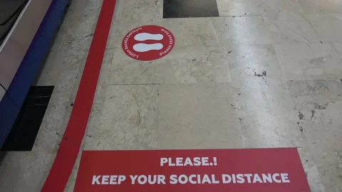 Viewing distance marking on the floor of the baggage dispensing point on arr Stock Footage 137027572