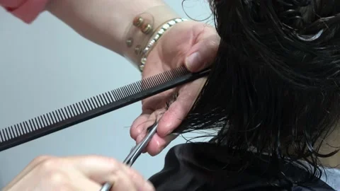 Viewing hands doing haircut Stock Footage 157039197