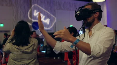 Viewing Hands in Virtual Reality at VRLA Stock Footage 49022349