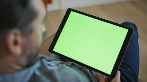 Viewing Ipad Tablet Green Screen Replacement in 8k Stock Footage 142926254
