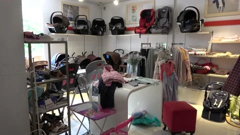 Viewing items at the second-hand shop Stock Footage 154420068