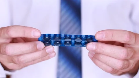 Viewing pack of tablets Stock Footage 90442718