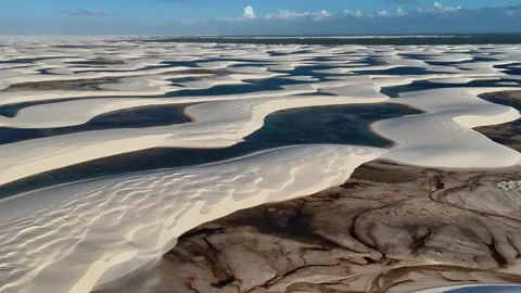 Viewing Pale Sand Ribbons and Dark Lagoon Channels at Lençóis Maranhenses Stock Footage 342443568