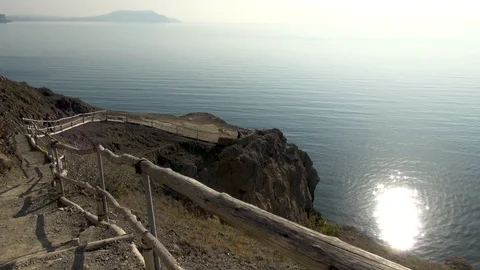 On viewing platform is young guy. Woman stands on Galitsyn trail. Stock Footage 108429451