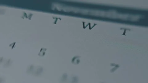 Viewing September days on digital calendar on smartphone screen to make a Stock-Footage 288964247
