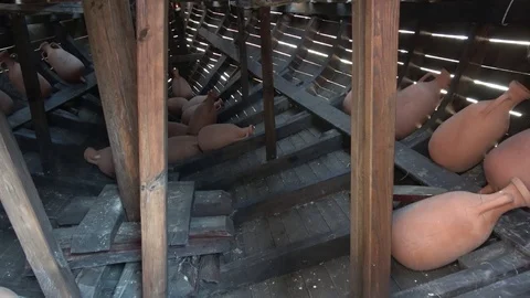 Viewing the ship hold with amphoras inside of ancient galley replica Stock Footage 120213050