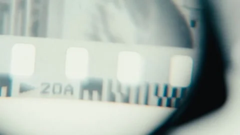 Viewing Street Scene On 35Mm Film Negative With Loupe, close up Stock Footage 283634297