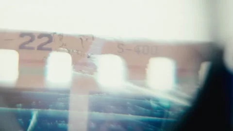 Viewing Street Scene On 35Mm Film Negative With Loupe, close up Stock Footage 284207955