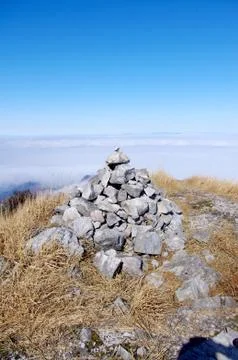 Viewing the top of high mountain form mountainside Stock Photos
