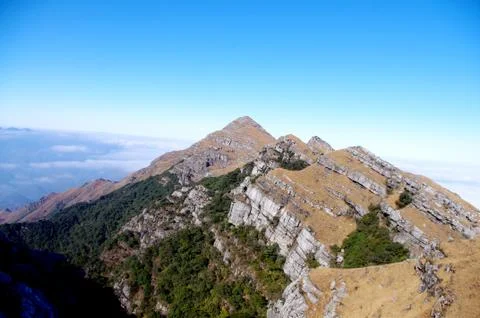 Viewing the top of high mountain form mountainsides Stock Photos