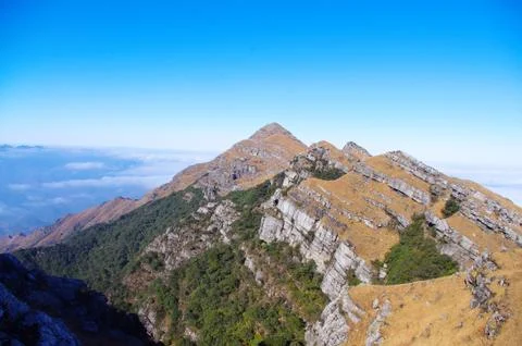 Viewing the top of high mountain form mountainsides Stock Photos