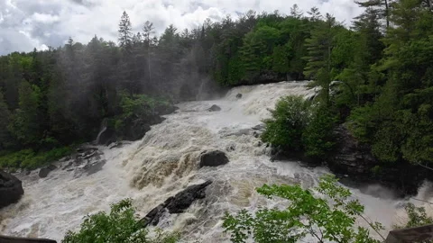 Viewpoint of Chutes de Plaisance Waterfall, Lush Forest, Quebec, Spring Stockbeeldmateriaal 337417921