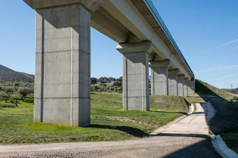 Views from below of an overpass of the train tracks near Grimaldo Foto stock