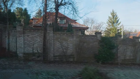 Views of Budapest from window of moving gear train through bare winter trees Stock-Footage 128296914