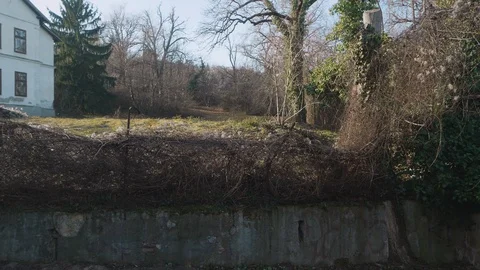 Views of Budapest from window of moving gear train through bare trees. Slowmo Stock Footage 128298525