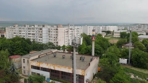 Views cell tower communications 3G, 4g, 5g cellular antennas in city. Stock Footage 132082973