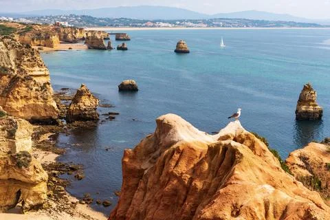 Views of the cliffs and beaches between the city of Lagos and Praia do Cami.. Stock Photos