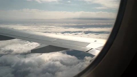 Views of the clouds from the window of an airplane. Concept: airlines, plane  Stock Footage 154162002